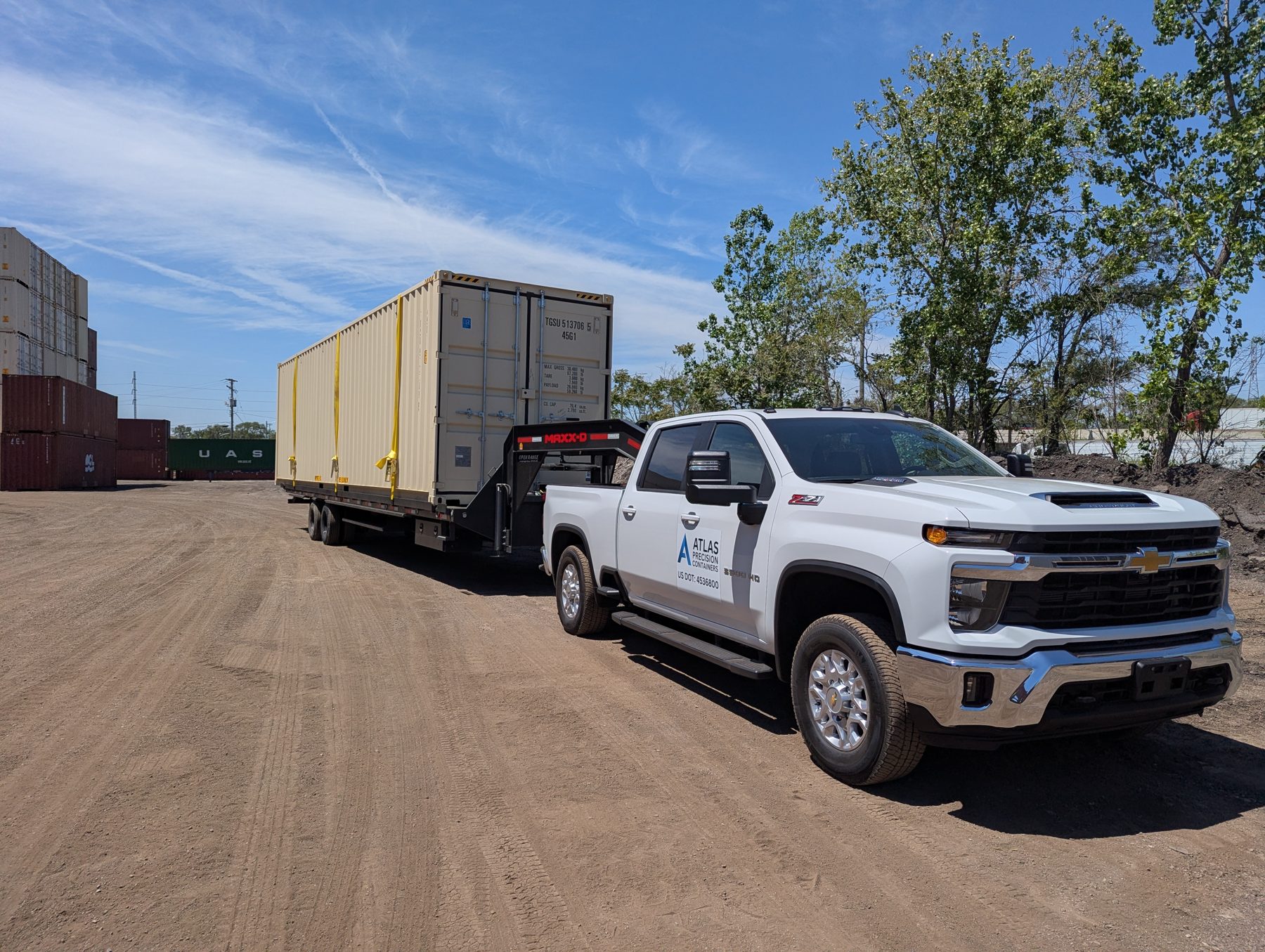 Container loaded and secured on Atlas Precision Containers trailer